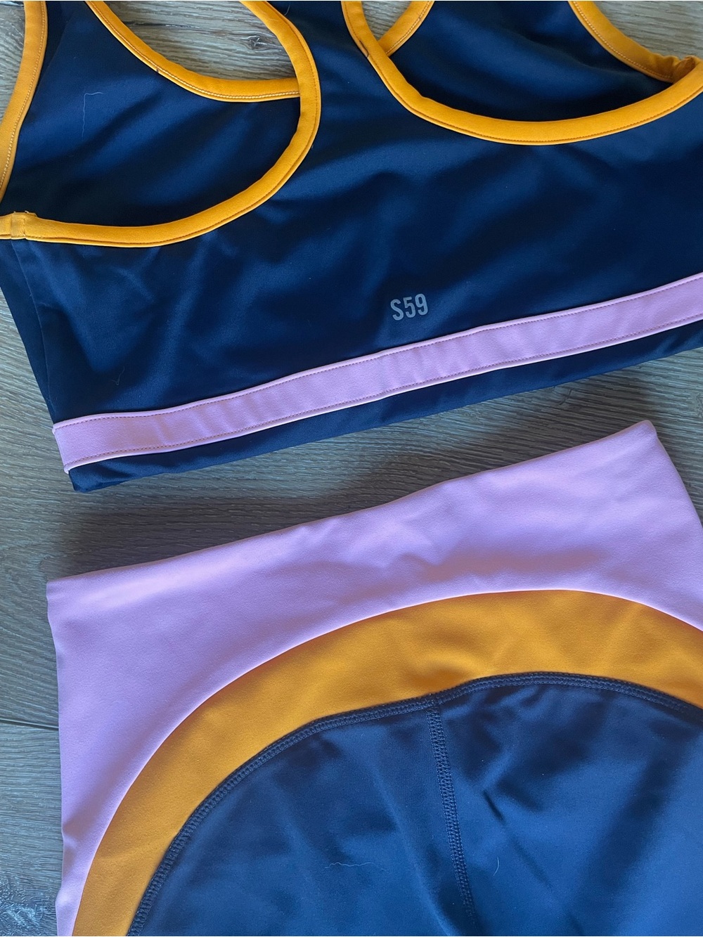 Splits59 Navy Bike Shorts & Sports Bra with Pink and Orange Trim - Picture 5 of 6